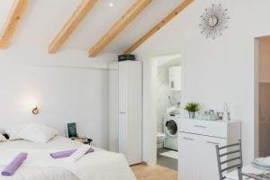 Postel nebo postele na pokoji v ubytování Studio Apartment Harmony NP Krka