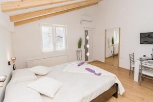 Postel nebo postele na pokoji v ubytování Studio Apartment Harmony NP Krka