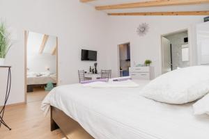 Postel nebo postele na pokoji v ubytování Studio Apartment Harmony NP Krka
