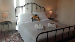Posteľ alebo postele v izbe v ubytovaní "RUNFULÌA" Deluxe apartment