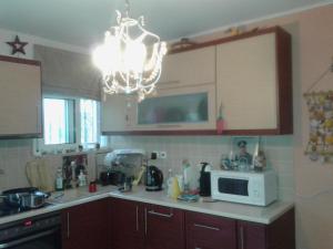 Kuchyň nebo kuchyňský kout v ubytování Villa Evi's