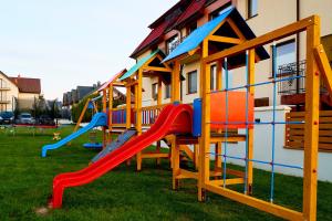 Herní místnost nebo prostor pro děti v ubytování Domki Ancora - komfortowe domki nad morzem