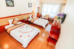 Postel nebo postele na pokoji v ubytování Paradis Hotel
