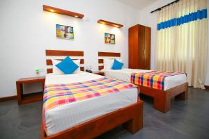 Postel nebo postele na pokoji v ubytování Hotel Alakamanda + 37 fotografií