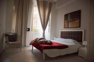 Posteľ alebo postele v izbe v ubytovaní Beautiful and Spacious Apartment next to Termini 10 minutes from Coliseum