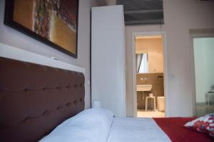 Posteľ alebo postele v izbe v ubytovaní Beautiful and Spacious Apartment next to Termini 10 minutes from Coliseum