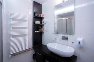 Vannituba majutusasutuses Apartments Trio +24 fotot