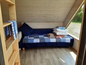 Postel nebo postele na pokoji v ubytování Päikesemajake 1