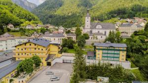 an aerial view of a town in the mountains at Landhotel Post Ebensee am Traunsee ***S in Ebensee