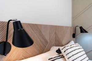 Łóżko lub łóżka w pokoju w obiekcie Malagaroom Victoria 43