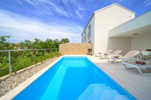 an image of a swimming pool in a house at Villa Terra in Županje