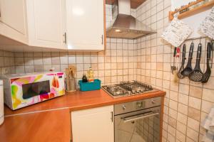 Kuchyňa alebo kuchynka v ubytovaní Apartment Rosse