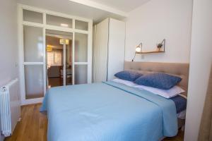 Posteľ alebo postele v izbe v ubytovaní Apartment Rosse