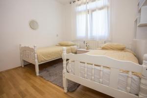 Posteľ alebo postele v izbe v ubytovaní Apartment Rosse
