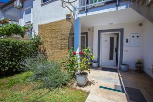 Vonkajšia záhrada v ubytovaní Apartment Rosse