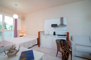 Postelja oz. postelje v sobi nastanitve Casa Palacio Cádiz by Luxury Suites Cadiz