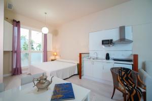 Posteľ alebo postele v izbe v ubytovaní Casa Palacio Cádiz by Luxury Suites Cadiz