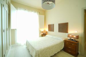 Posteľ alebo postele v izbe v ubytovaní Casa Palacio Cádiz by Luxury Suites Cadiz