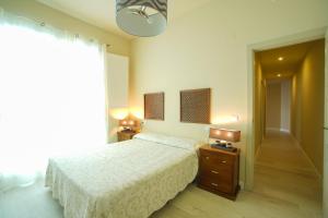 Posteľ alebo postele v izbe v ubytovaní Casa Palacio Cádiz by Luxury Suites Cadiz