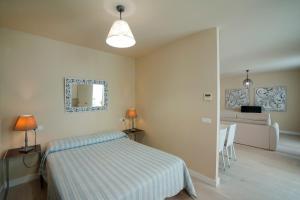 Posteľ alebo postele v izbe v ubytovaní Casa Palacio Cádiz by Luxury Suites Cadiz