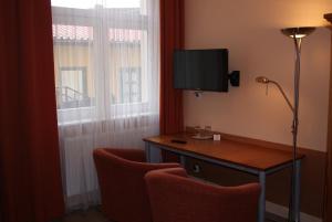 Telewizja i/lub zestaw kina domowego w obiekcie Hotel Alga