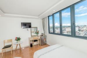 TV a/nebo společenská místnost v ubytování Hotel Pansy