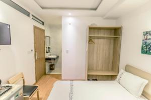 Postel nebo postele na pokoji v ubytování Hotel Pansy