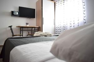 Postel nebo postele na pokoji v ubytování Rooms Ruza