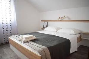 Postel nebo postele na pokoji v ubytování Rooms Ruza