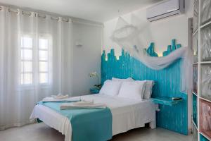 A bed or beds in a room at Villa Haritomeni