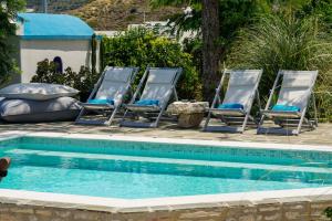 The swimming pool at or close to Villa Haritomeni