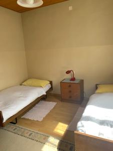 Postelja oz. postelje v sobi nastanitve Albergo Calancasca Ristorante Jaipur