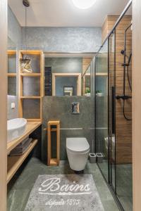 Een badkamer bij Grey Horse Apartments
