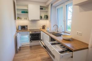 Η κουζίνα ή μικρή κουζίνα στο Central and Relaxing apartment