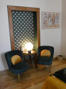 Posezení v ubytování Au Crapaud Charmant