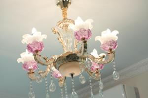 a chandelier is hanging from a ceiling at Min Le Yuan B&B-include long stay in Hualien City