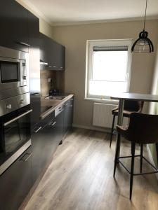 Kuchyň nebo kuchyňský kout v ubytování Ferienwohnung Schlich + 18 fotografií