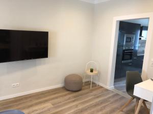 TV a/nebo společenská místnost v ubytování Ferienwohnung Schlich
