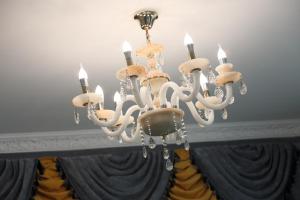 a chandelier hanging from the ceiling in a room at Min Le Yuan B&B-include long stay in Hualien City