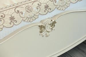 a metal bed frame with a floral pattern on it at Min Le Yuan B&B-include long stay in Hualien City