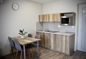 Kuchyň nebo kuchyňský kout v ubytování Jazmin apartmány