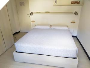 Posteľ alebo postele v izbe v ubytovaní La mansarda sul Porto