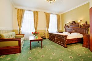 Łóżko lub łóżka w pokoju w obiekcie Pałac Margot Nature&SPA