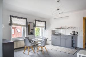 Kuchyň nebo kuchyňský kout v ubytování Willa Onyks Apartamenty