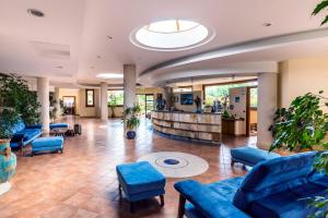 The lobby or reception area at Hotel Santa Chiara