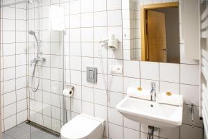 
A bathroom at Leśna Oaza
