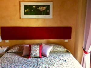 Postel nebo postele na pokoji v ubytování Dolce Vita in Tuscany B&B