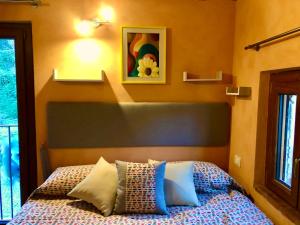 Postel nebo postele na pokoji v ubytování Dolce Vita in Tuscany B&B