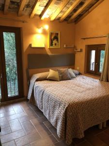 Postel nebo postele na pokoji v ubytování Dolce Vita in Tuscany B&B