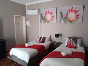 Postel nebo postele na pokoji v ubytování Caledon Overnight Rooms + 37 fotografií